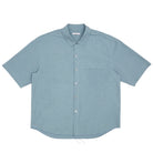 Light blue short-sleeve shirt on a white background