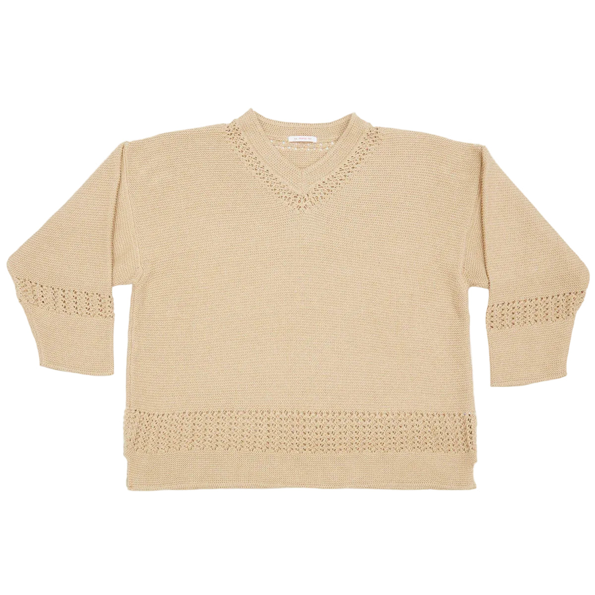 Beige sweater with textured pattern on a white background