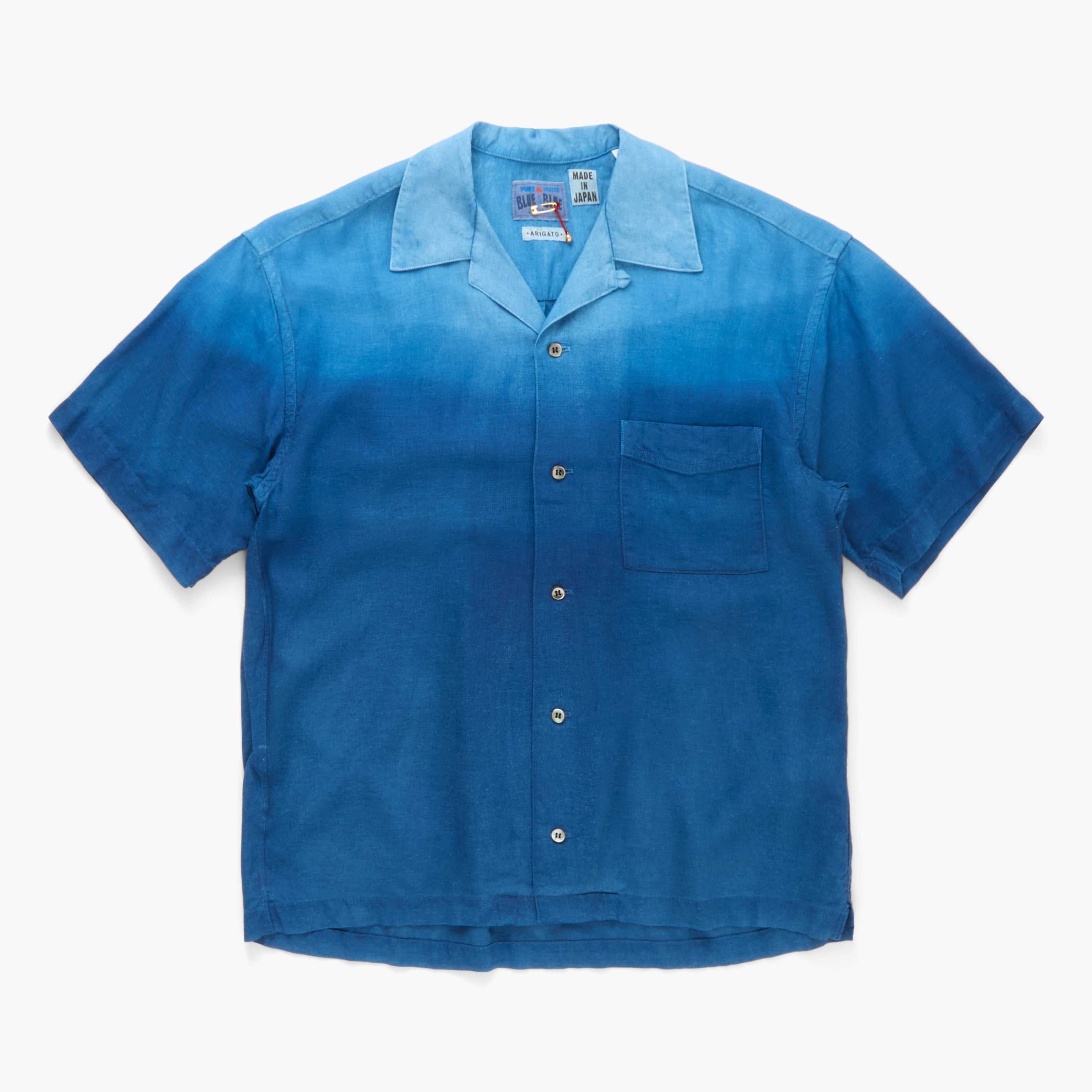 Blue short-sleeve shirt with collar and pocket on a white background