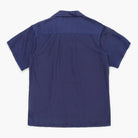 Navy blue short-sleeve shirt on a white background