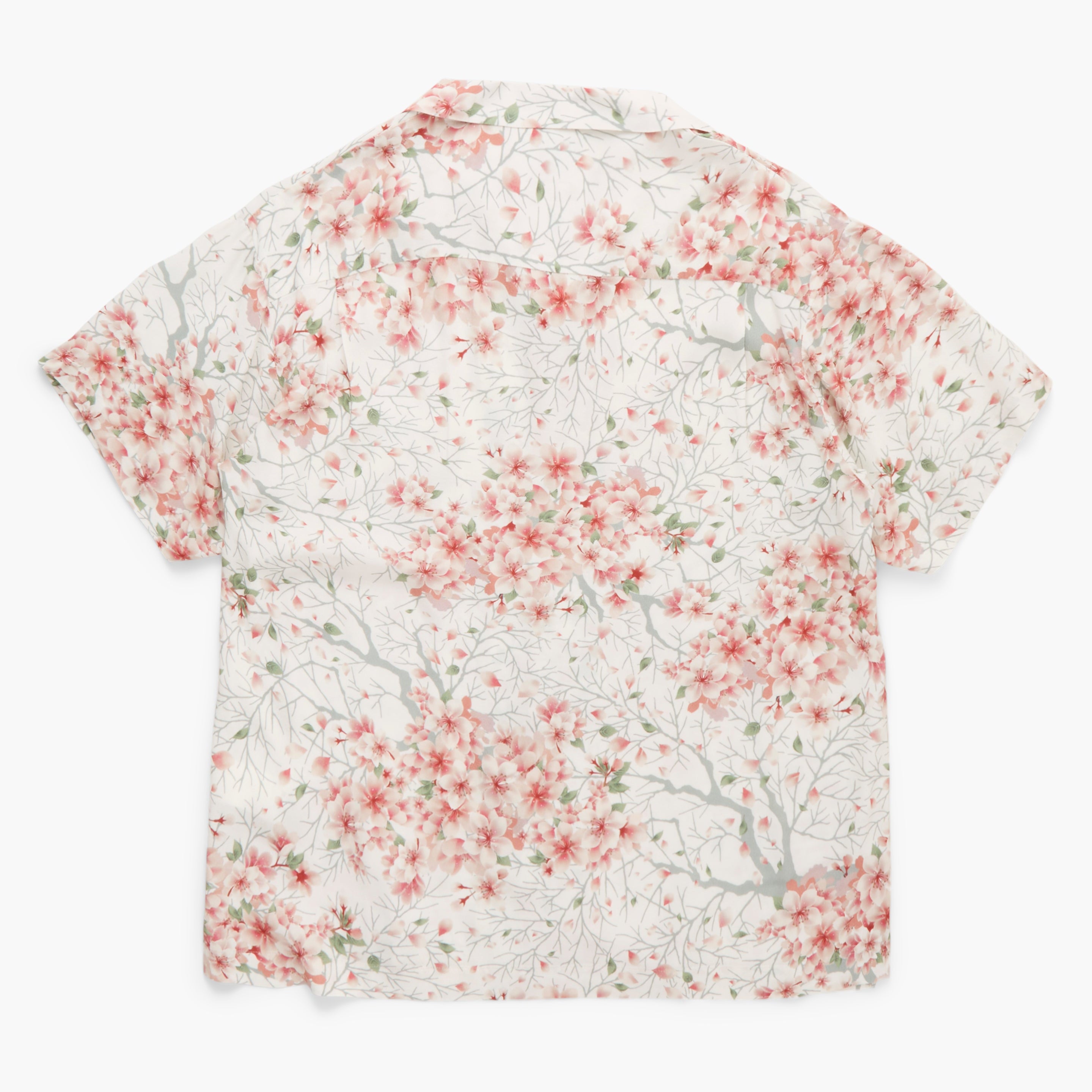 Short-sleeve shirt with floral pattern on a white background