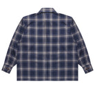 Plaid shirt with blue and white pattern on a light gray background