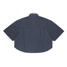 Back view of a dark blue checkered shirt on a white background