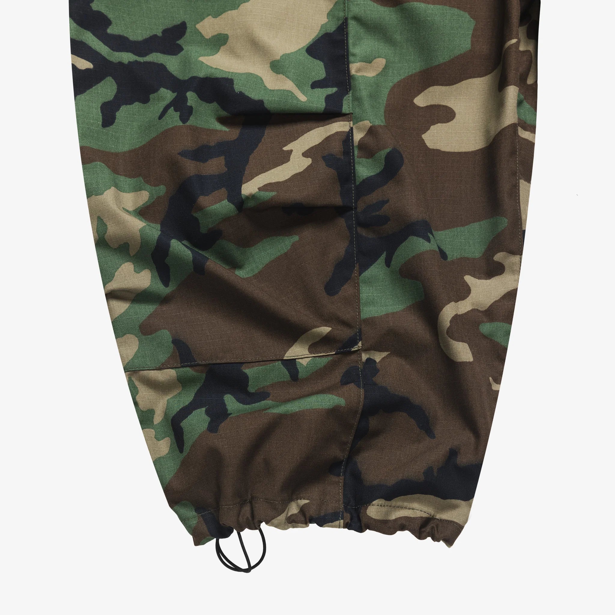 Camouflage-patterned drawstring bag on a white background
