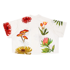 White shirt with colorful floral designs on a white background