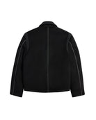 Black jacket with white stitching on a light background
