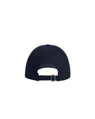 Navy blue cap with a white interior and black strap on a light gray background