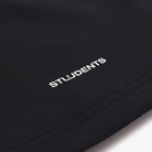 Black fabric with 'STUDENTS' printed in white on a white background