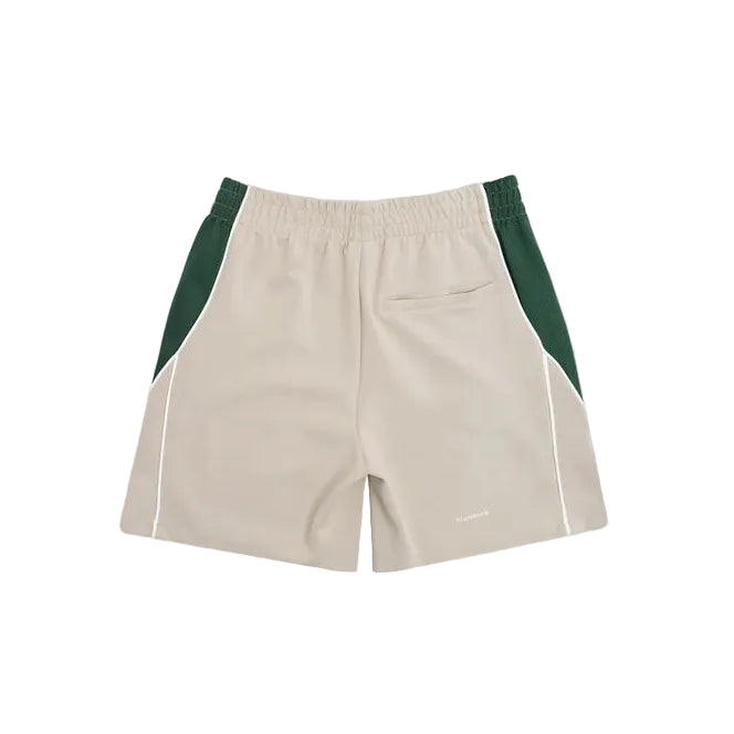 Beige shorts with green accents on a white background