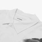 White shirt collar with a brand logo on a white background