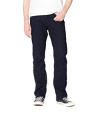 Person wearing navy pinstripe pants and black sneakers on a white background