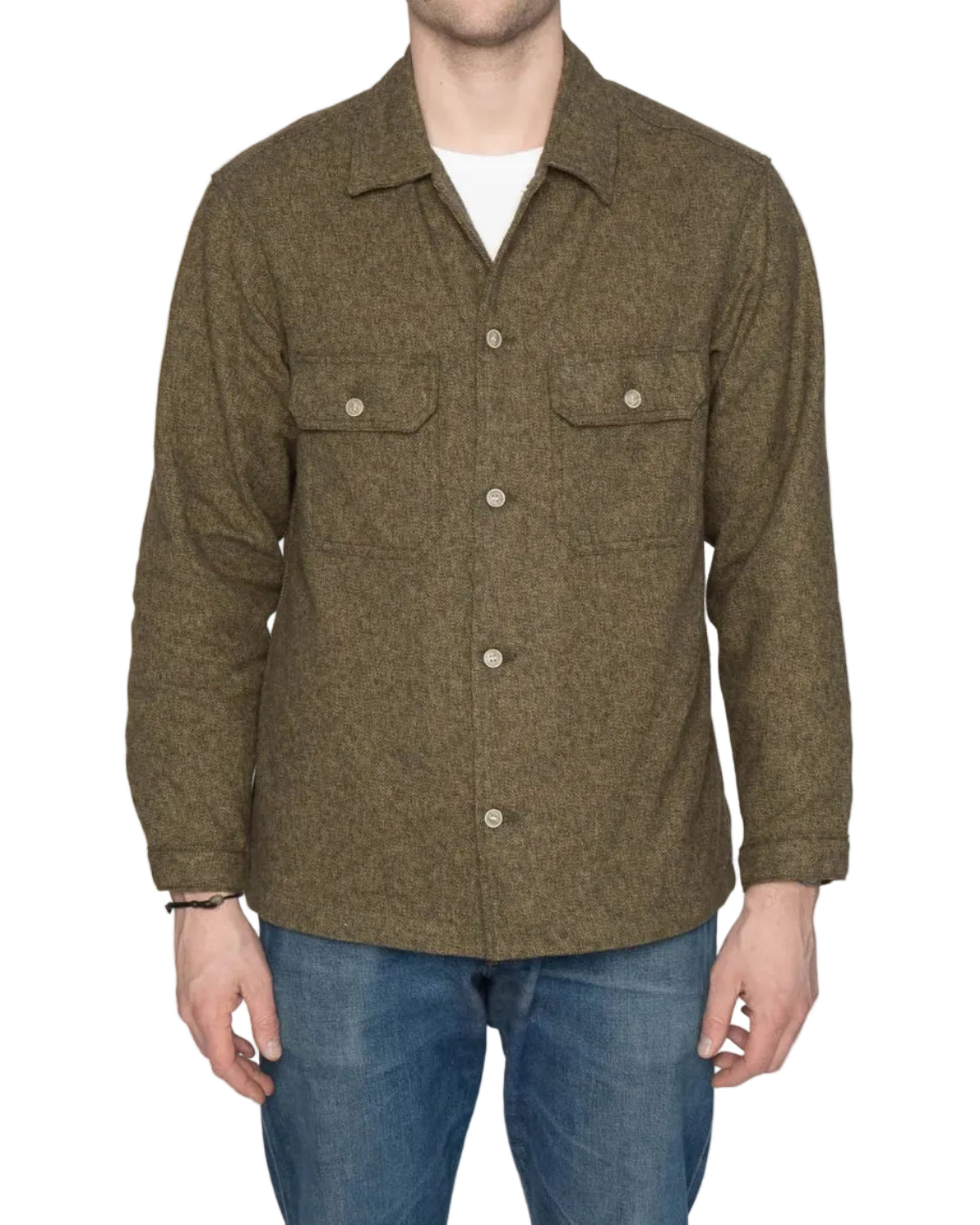 Man wearing a green jacket and blue jeans against a white background