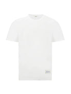 White t-shirt with a small logo on a white background