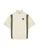 White shirt with green accents on a white background