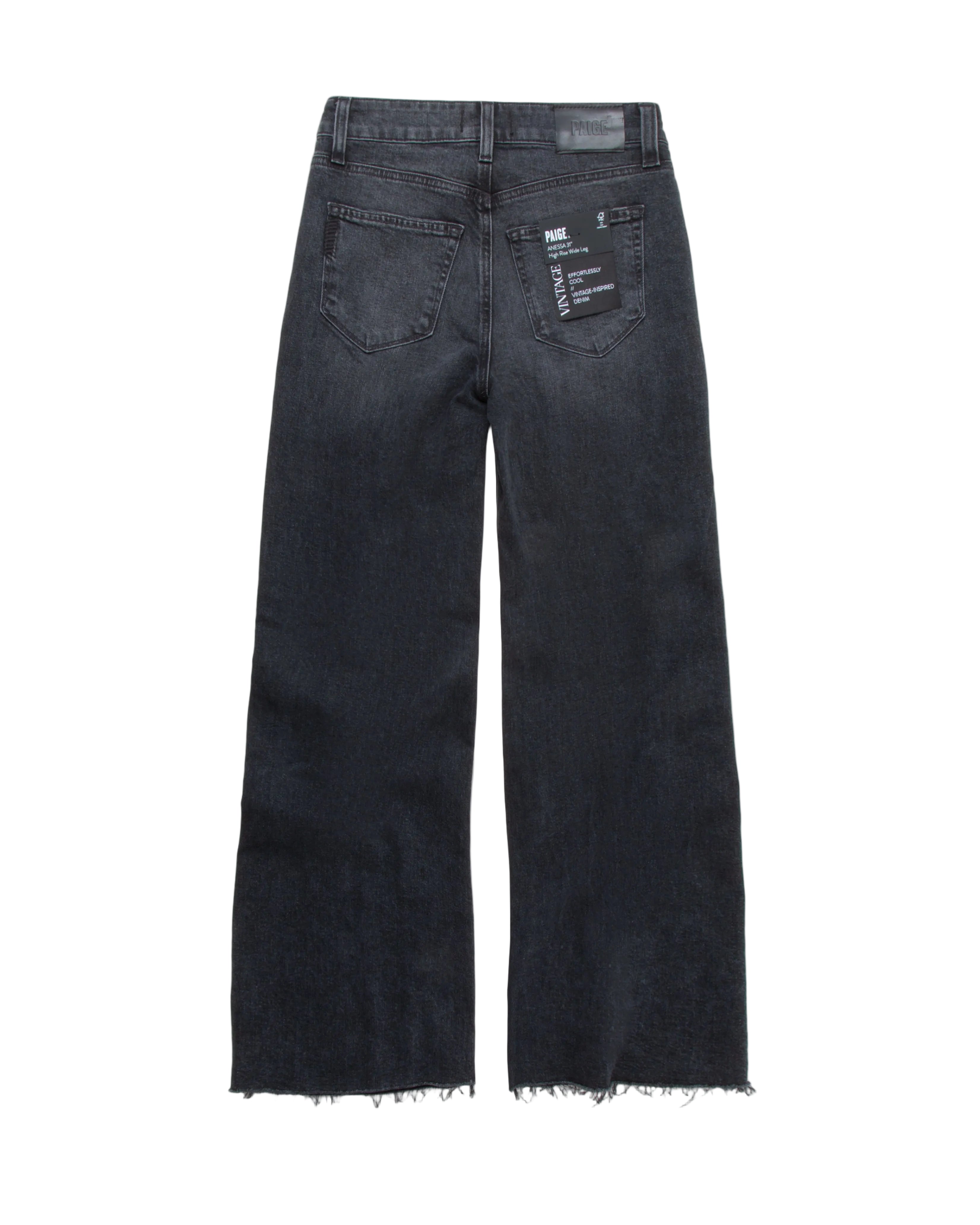 Black jeans with frayed hems on a white background