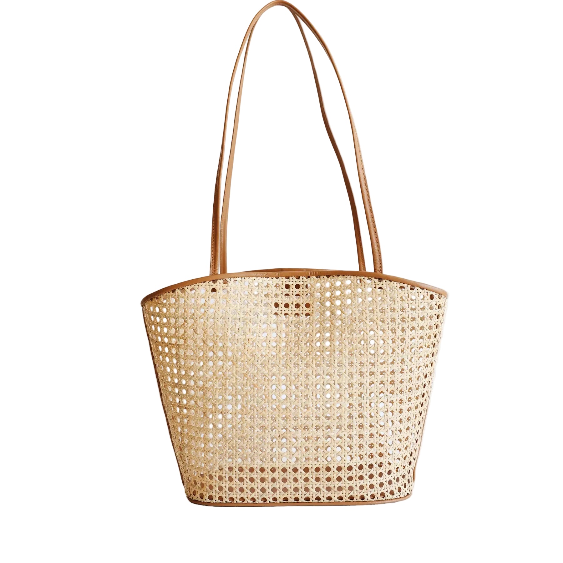 Tan woven tote bag on a white background