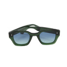 Green sunglasses with blue gradient lenses on a white background
