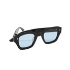 Black sunglasses with light blue lenses on a white background