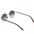 Sunglasses with tortoiseshell frame on a white background