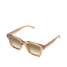 Sunglasses with a brown frame and gradient lenses on a white background