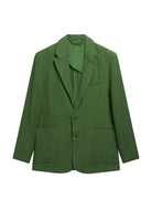 Green blazer on a white background