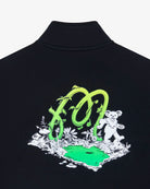 Black shirt with green and white graphic design on a white background