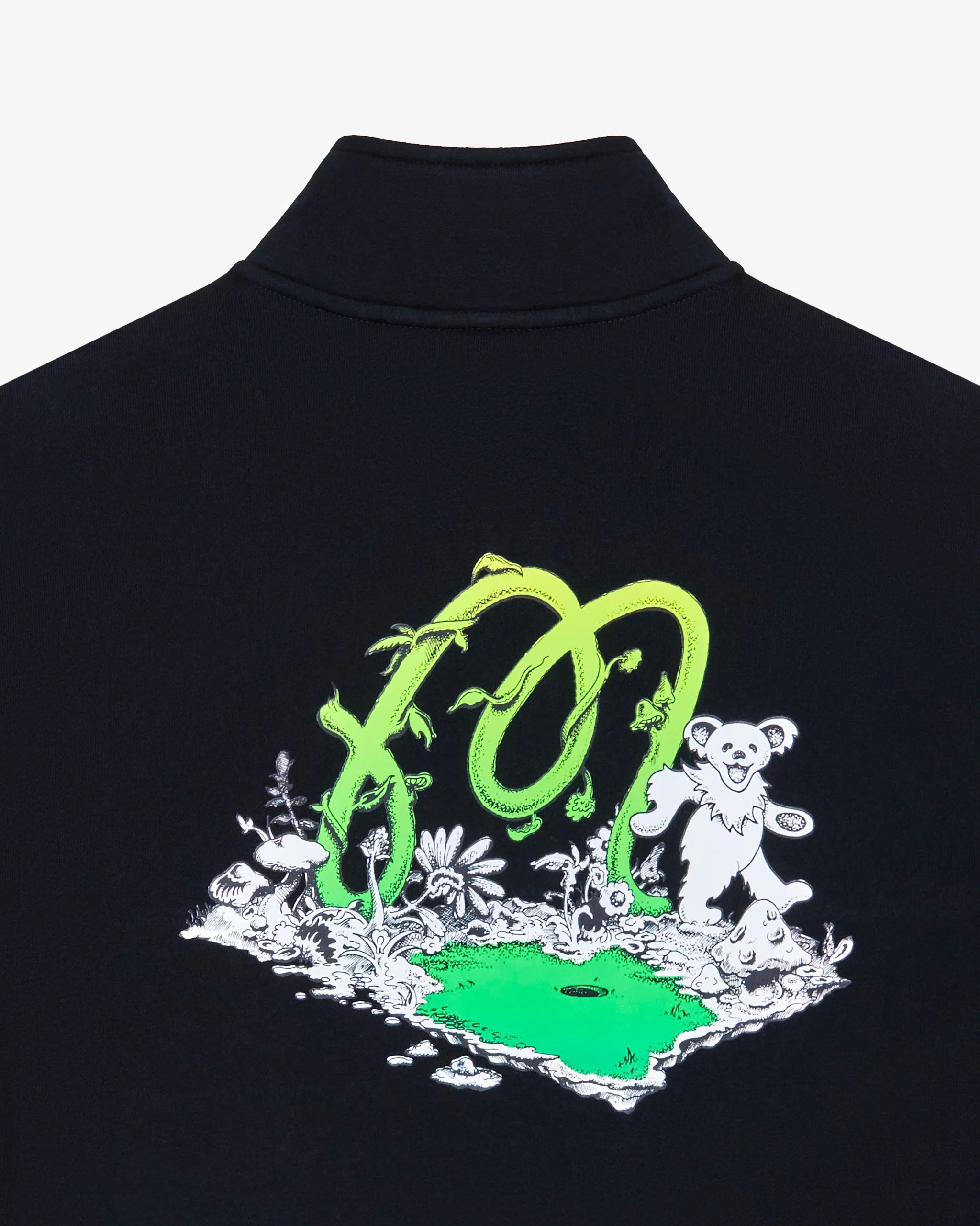 Black shirt with green and white graphic design on a white background