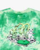 Tie-dye t-shirt with a graphic design featuring a bear and text on a green and white background.