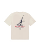 Beige t-shirt with sailboat graphic and 'Malbon Golf' text on a white background