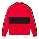 A red long-sleeve polo shown from the back, featuring a wide black horizontal stripe down the middle and black shoulder panels with thin white piping.