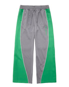 Gray athletic pants with bright green side panels and white piping, featuring a gray drawstring waistband and a small green script logo on the upper right thigh.