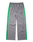 Gray athletic track pants with green side stripes and a thin white piping accent, shown flat against a white background.