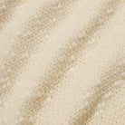 Close-up of beige textured fabric