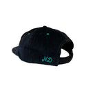 Black cap with green logo on a white background