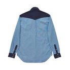 Blue denim shirt with navy accents on a white background