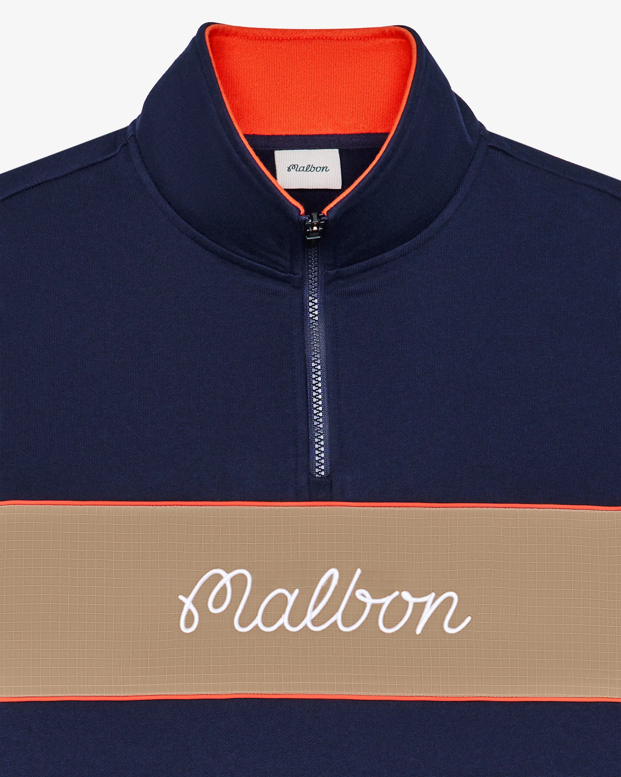 Navy and beige pullover with 'Malbon' branding on a white background