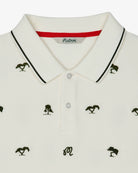 White polo shirt with black trim and small tree designs on a white background