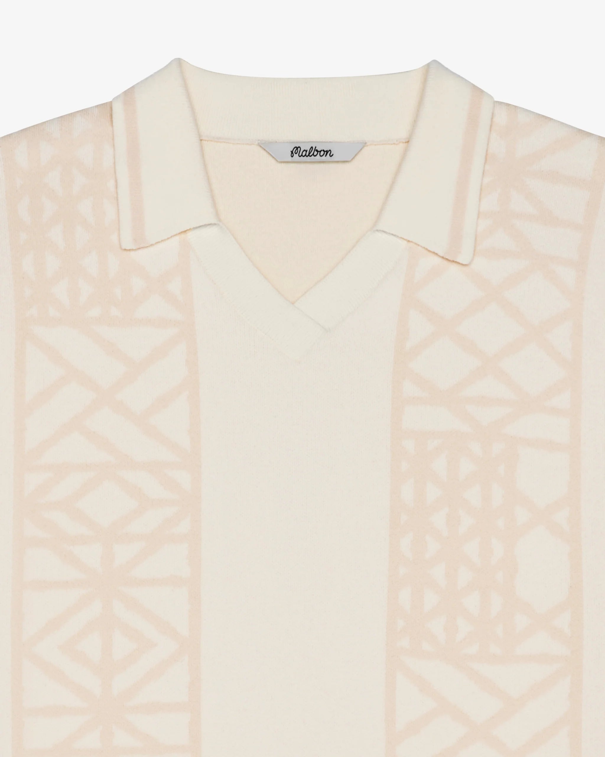 Light pink patterned garment with 'Malbon' label on a white background