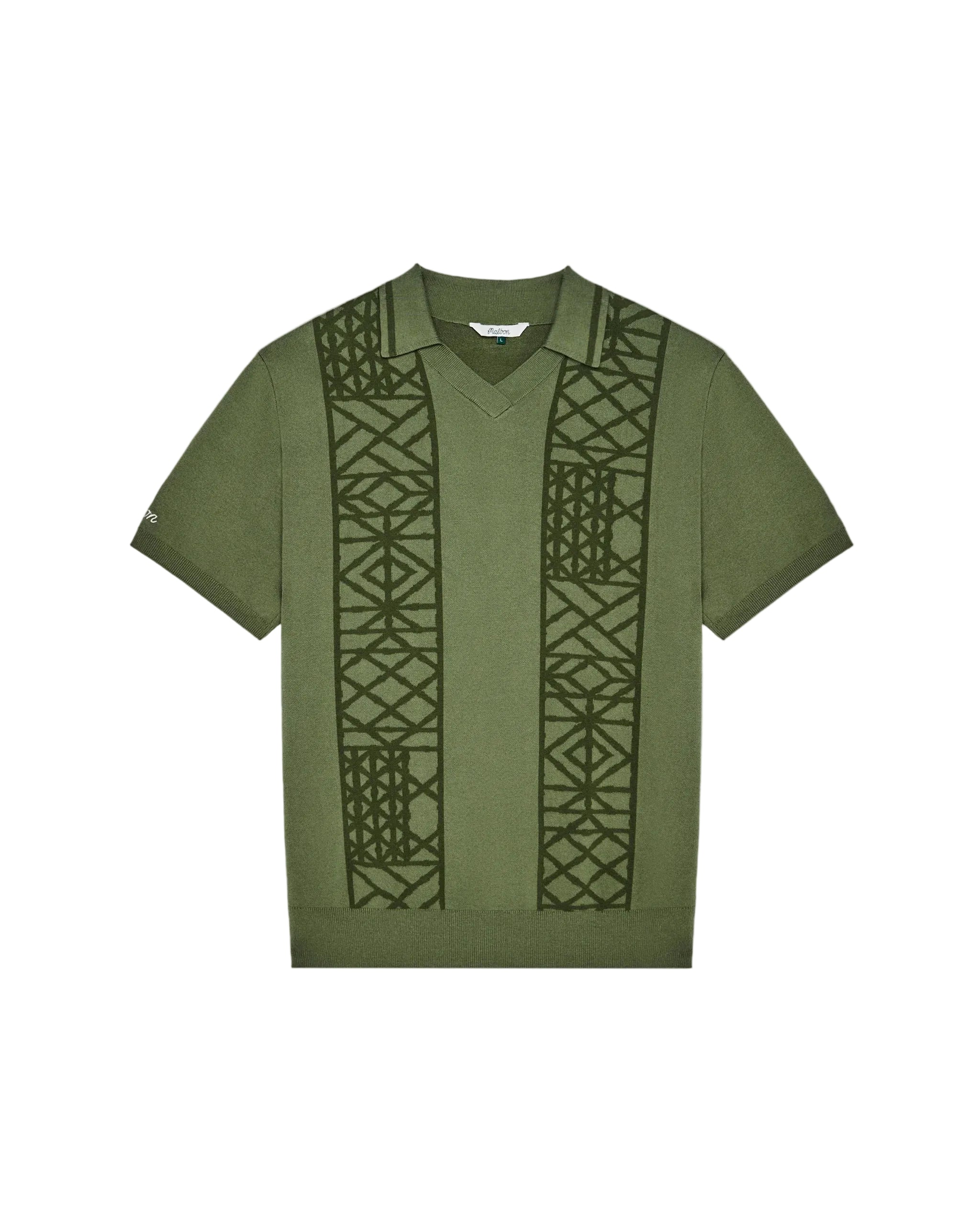 Green t-shirt with geometric pattern on a white background