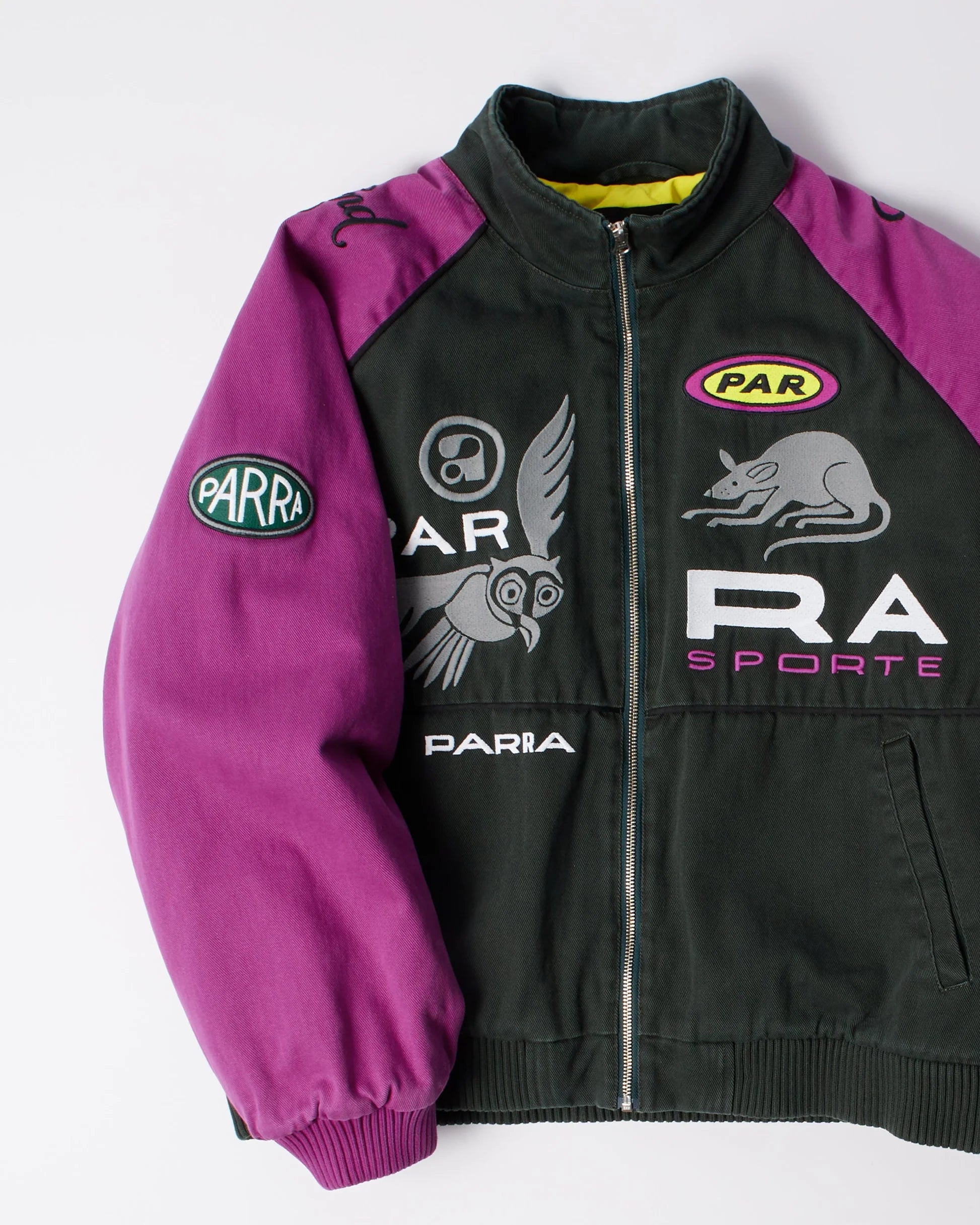BY PARRA Owl Meets Rats Racing Jacket in black with purple sleeves, front view