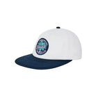 White and navy cap with a logo on a white background
