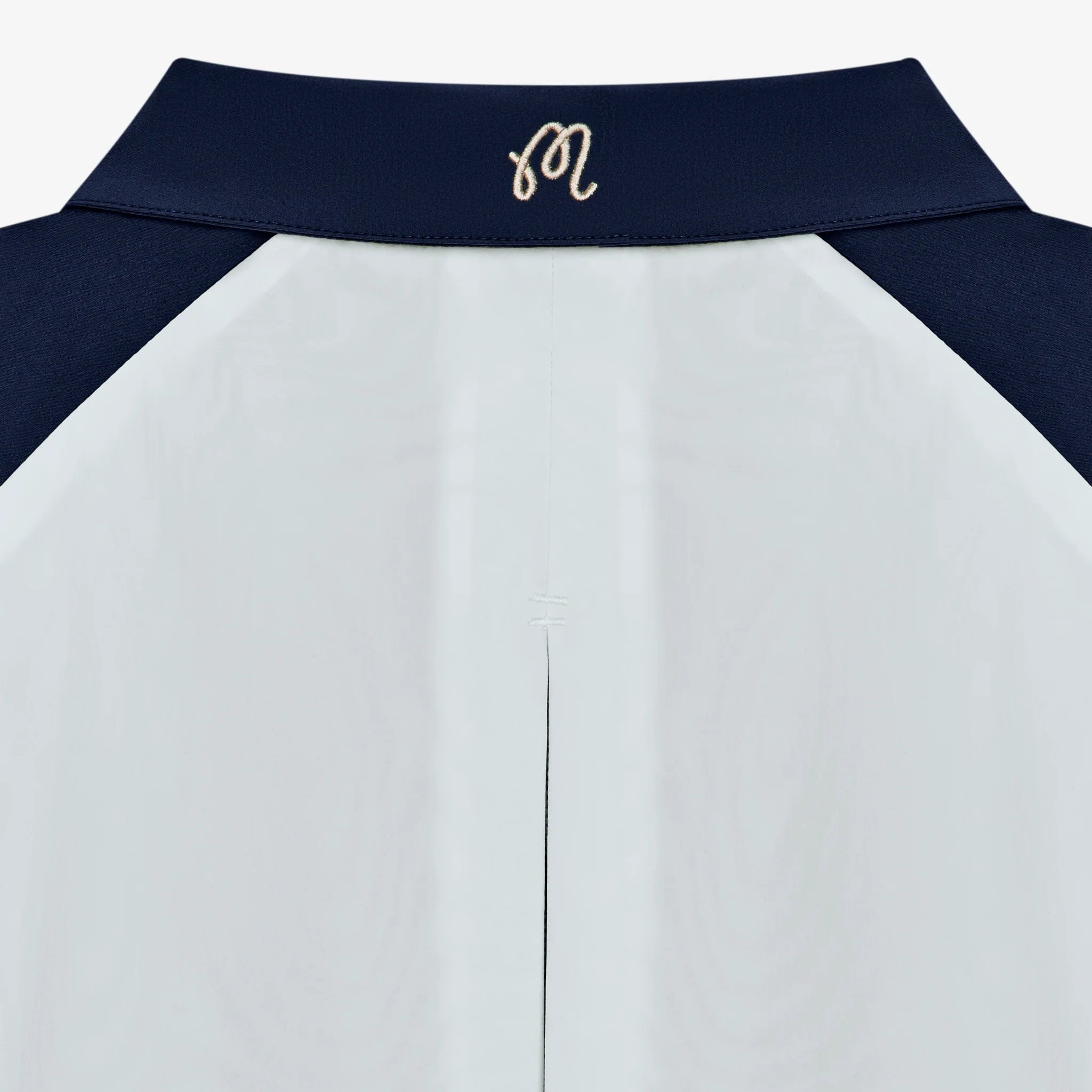 Close-up of a white and navy windbreaker collar with a branded monogram on a white background
