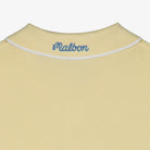 Yellow shirt with 'Malbon' branding on a white background
