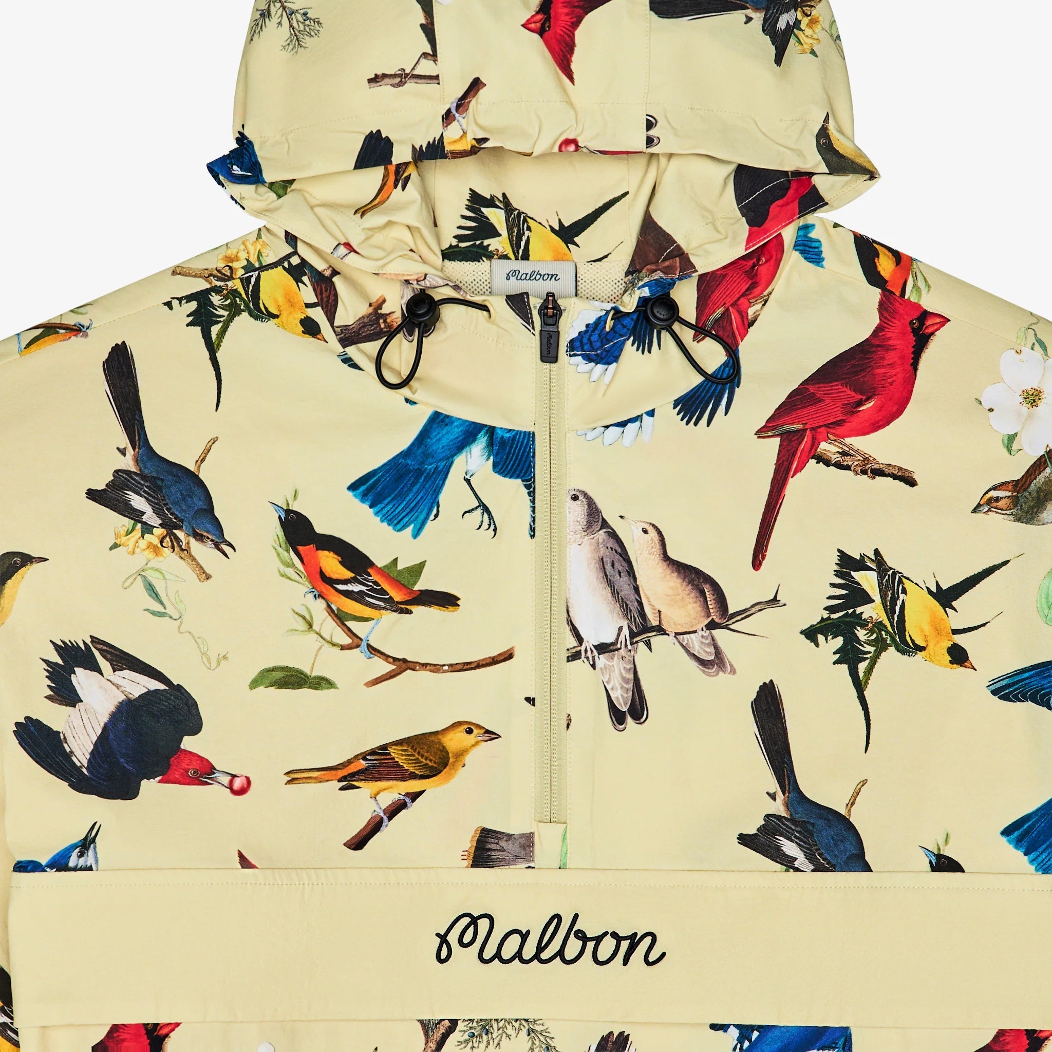 Hoodie with bird pattern and Malbon branding on a beige background