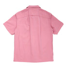 Pink short-sleeve shirt on a white background