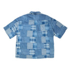 Blue patchwork shirt on a white background