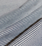 Close-up of blue and white striped fabric 