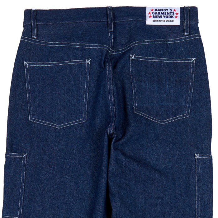 Back view of blue jeans with a brand label on a white background