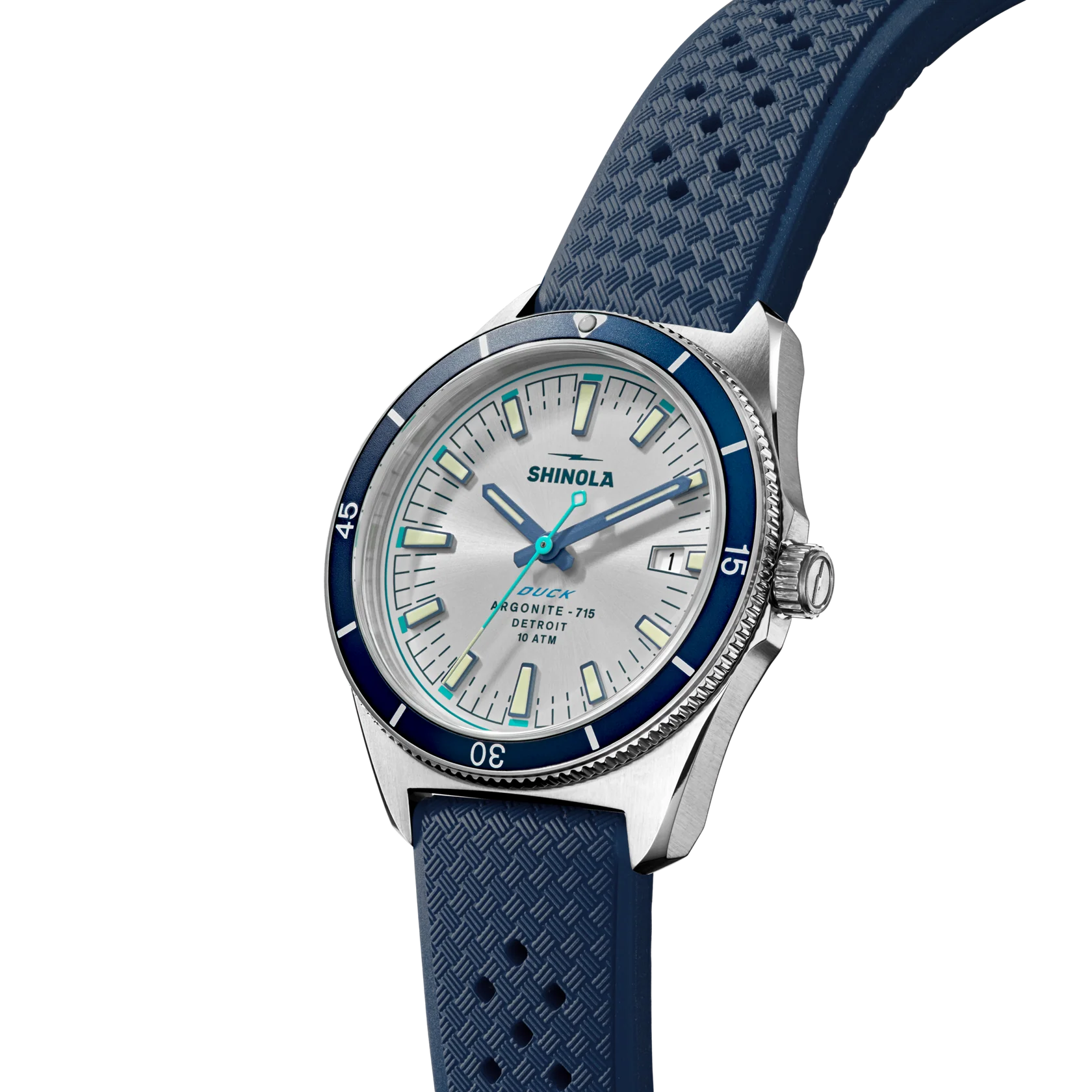 Shinola watch with blue strap and silver case on a white background