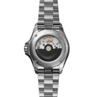Silver watch with a detailed mechanical movement on a white background